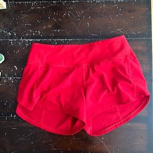 Size 6 red lululemon speed up shorts